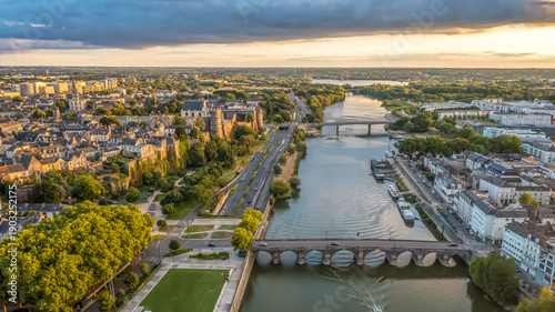 Aerial view with sunset scenery in beautiful city of Angers , with famous chateau and cathedral