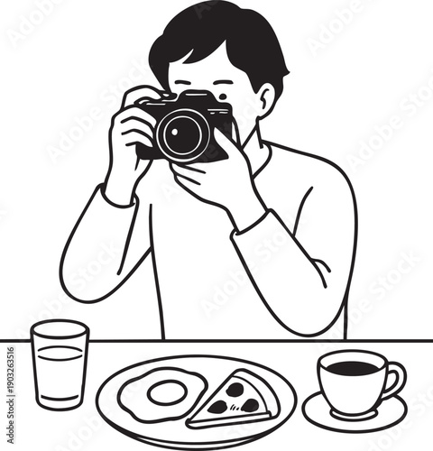 Man taking photo of food on table with cup and glass