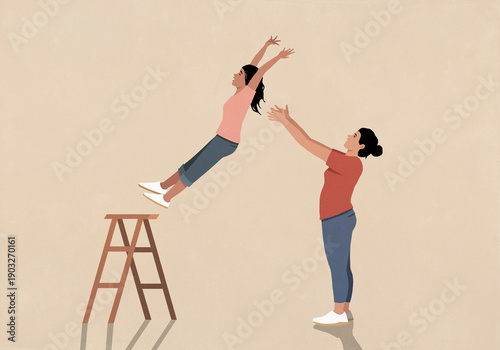 Mother catching daughter in a trust fall against beige background