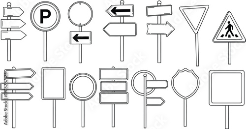 Various blank and informational road signs on poles in black and white