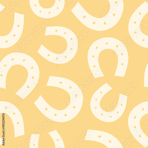Seamless vector pattern for St. Patrick's Day with horseshoe shadows on a yellow background, for holiday printing, posters or other holiday designs