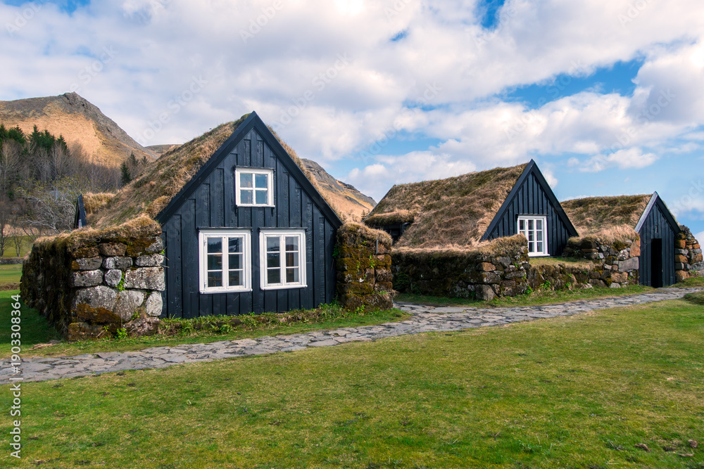 Fototapeta premium grass roof, icelandic culture, rural, historical, nordic, wooden house, remote, scenic, green roof, folklore, viking house, heritage building, heritage, history, northern europe, turf houses, traditio