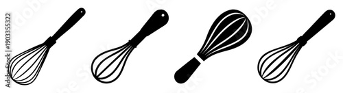 Set of four black and white wire whisks isolated on white background for kitchen cooking