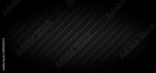 Carbon fiber texture background with black wicker pattern. Dark metallic industrial weave surface with 3D effect and vignette. Professional automotive and high-tech material backdrop for design.
