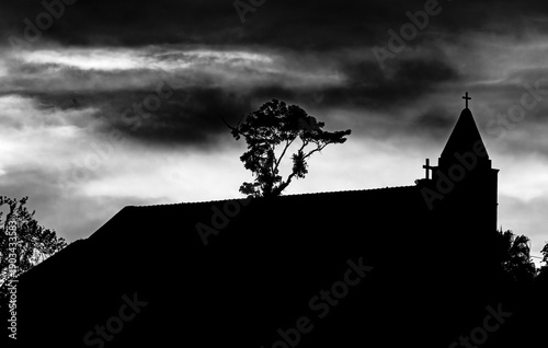 Fototapeta kuchenna Silhouette of a church at sunset.