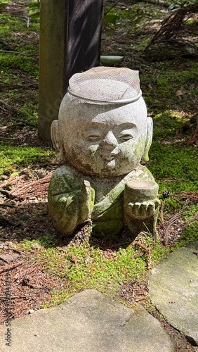 Small stone statue of Jizo in Japan