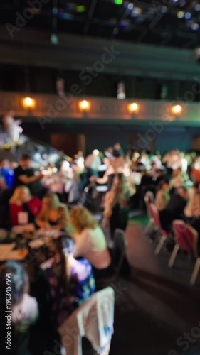 Wallpaper Mural Participants engage with one another around tables beneath warm lights and melodic background tunes Torontodigital.ca