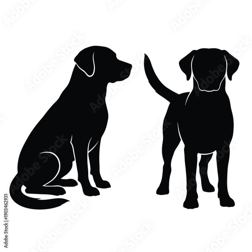 Two black silhouettes of dogs facing each other one sitting one standing