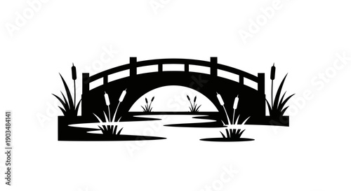 Black silhouette of an arched bridge over water with reeds and cattails, depicting a serene garden or pond scene.