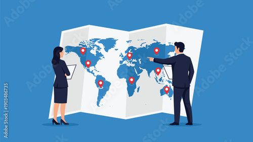 Business professionals analyzing global market expansion and logistics locations on a large world map with red pin markers.