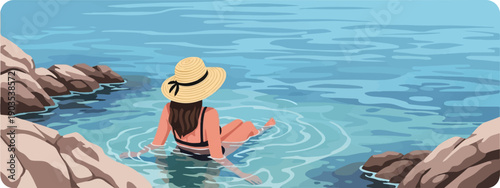 Woman in straw hat sits in clear blue water, near rocky shoreline