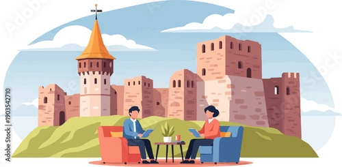 Two people sit in armchairs on a grassy hill discussing tablets in front of a stone castle