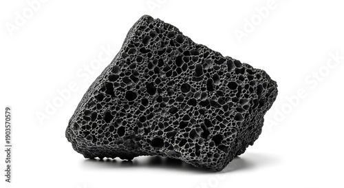 A black porous rock with a unique texture on a white background
