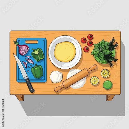 A kitchen table layout featuring various ingredients and cooking tools