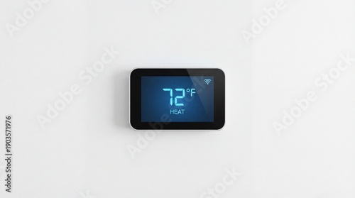 Modern smart thermostat displaying a warm heating temperature of 72 degrees Fahrenheit and an active wireless connection icon against a pristine white