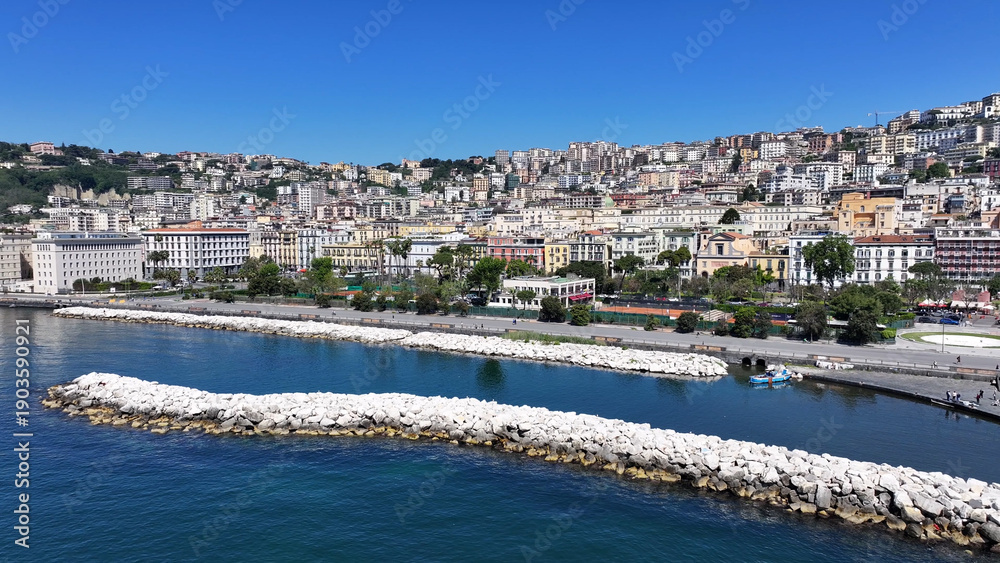 Obraz premium Villa Comunale Park In Naples Campania Italy. Breathtaking Aerial Landscape Of Famous Leisure Park Of The City. Business Sky Background Downtown Cityscape. Outdoor Downtown Panning Wide.