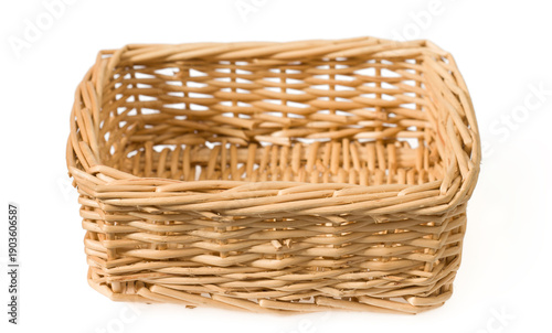 Handmade wicker basket isolated on white background.