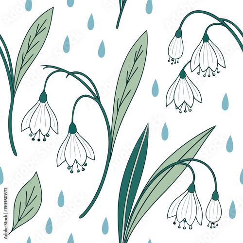 Delicate white flowers with green leaves and blue raindrops on a light background