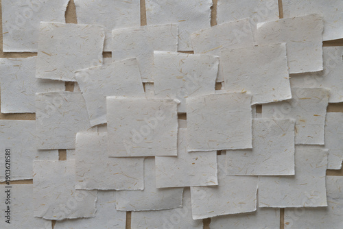 layered torn paper tiles