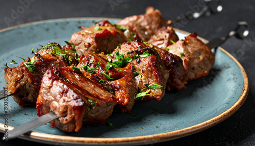 Meat skewer kebab, grilled beef on ceramic plate, protein-rich and appetizing snack. Tasty food.