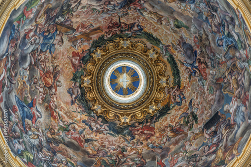 Italy - Rome - Sant Agnese in Agone - Holy Spirit dove radiates glory amid swirling angels and heavenly clouds in dome fresco