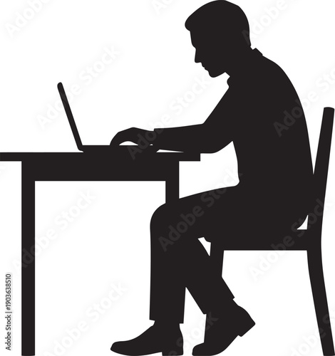 Silhouette of man working on laptop in office