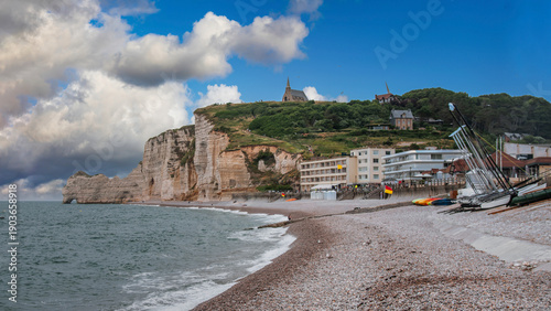Billede på lærred The town of Etretat, a famous landmark in France for its cliffs and arches