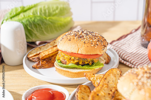Quadro su tela Classic homemade cheeseburger with lettuce and tomato