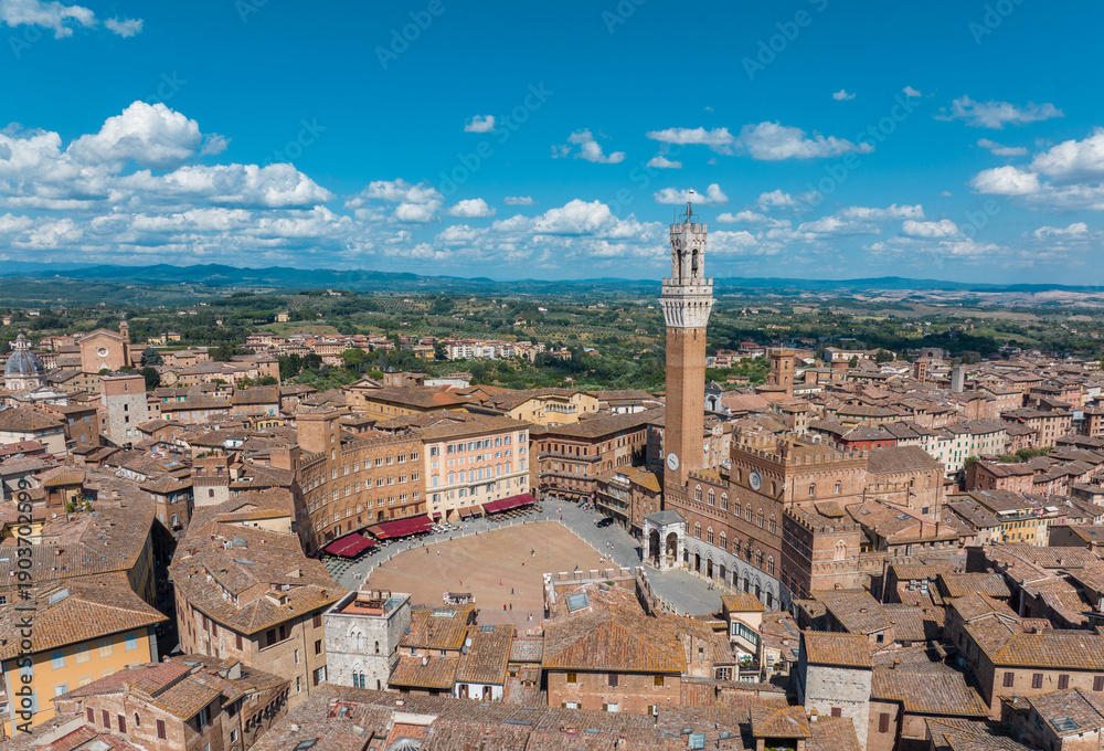 Fototapeta premium Aerial view of Siena, Piazza del Campo (Campo square), Palazzo Publico and Torre del Mangia (Mangia tower), Tuscany, Italy