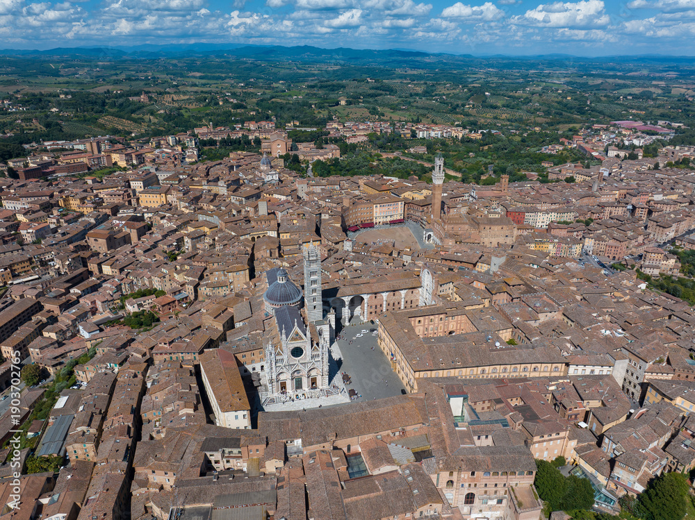 Fototapeta premium Aerial view of Siena, Duomo di Siena, Piazza del Campo (Campo square), Palazzo Publico and Torre del Mangia (Mangia tower), Tuscany, Italy