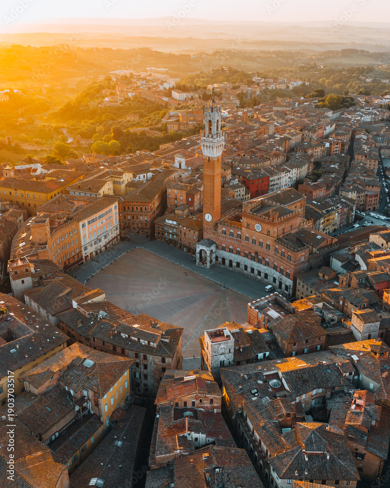 Fototapeta premium Aerial View of Torre del Mangia and Piazza del Campo at Sunset, Siena, Tuscany, Italy