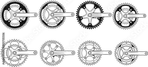 Eight black and white bicycle crankset chainring arranged in two rows bike cycling