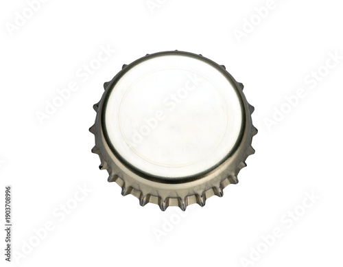 A shiny, silver bottle cap with a white surface on a black background