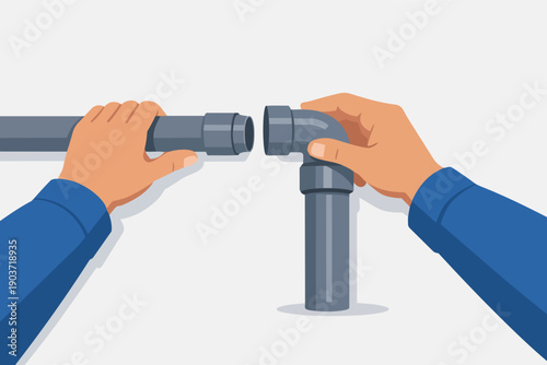 Plumber hands fitting pvc pipe connector, working on plumbing installation