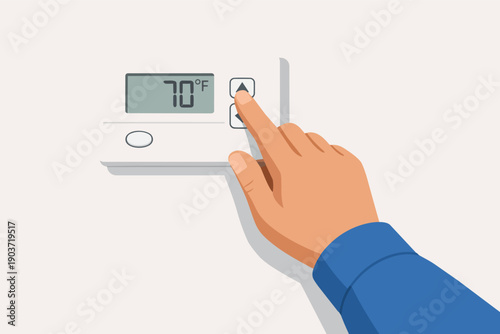 Hand adjusting digital thermostat to control home temperature and energy saving
