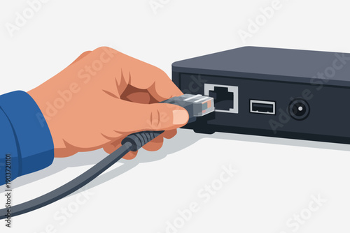 Hand connecting ethernet cable into router for network and internet access