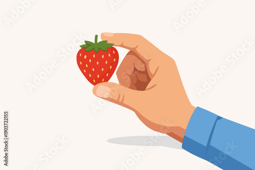 Hand picking fresh ripe strawberry, symbol of healthy eating and organic fruit