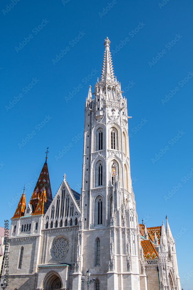 Fototapeta premium Matthias Church tower with colorful roof in Budapest Hungary