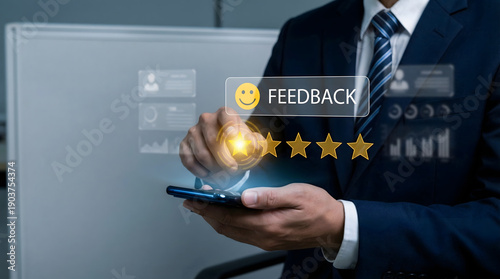Professional in suit gives five star rating on glowing holographic feedback system using smartphone in modern digital environment