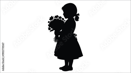 Young girl holding flowers in a dark striking silhouette