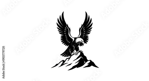 Eagle perched on mountain crest silhouette