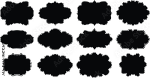 Collection of 12 black inkblot shapes on white background