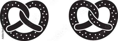 Silhouette of two pretzels with salt on a white background