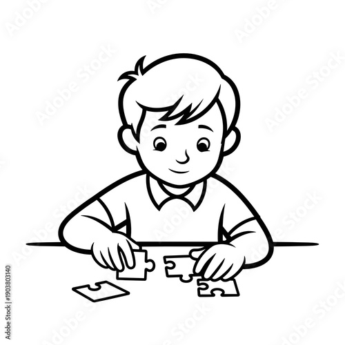 Boy assembling puzzle pieces at table, smiling with concentration  
