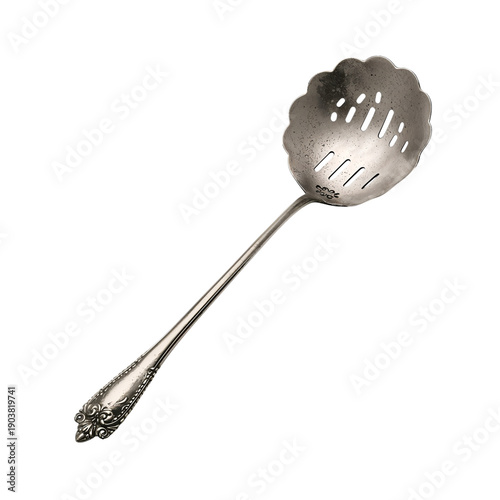 Silver Serving Spoon With Ornate Handle Placed on a Plain Background for Disp...