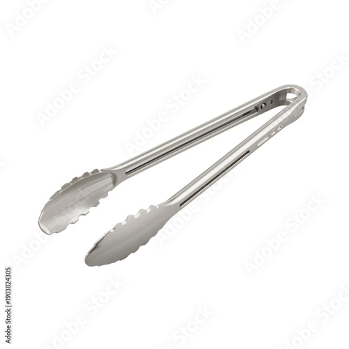 Tongs Resting on a Table in a Kitchen During Meal Preparation