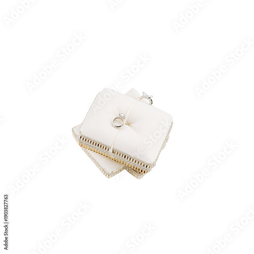 Showcase of a Wedding Ring on a Decorative Cushion at a Ceremony