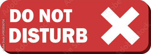 Red sign with white text and symbol indicating do not disturb on a rectangular shape viewed from the front