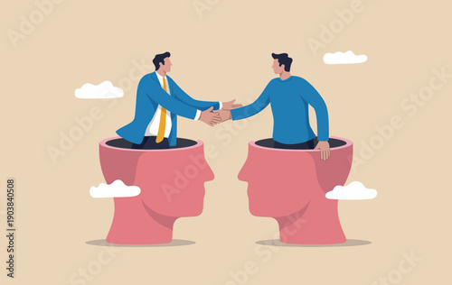 Two businessmen shaking hands while emerging from giant human heads for mutual understanding