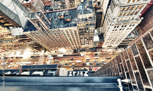 Photography Amazing skyscrapers in Midtown Manhattan, aerial view from rooftop with traffic